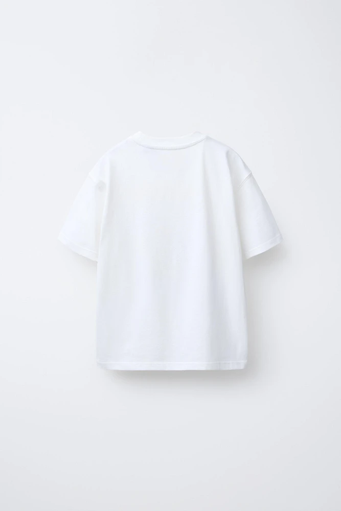 THE SIMPSONS ™ MATT GROENING CARAVAN T-SHIRT