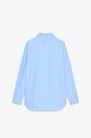 CHEMISE EN POPELINE AVEC ANNEAU DANS LE DOS