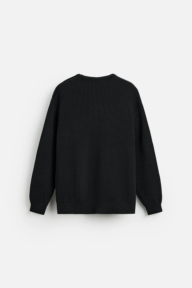 PULL STRUCTURÉ À BOUTONS