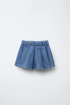 PLEATED DENIM SHORTS