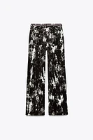 Z1975 HIGH RISE FLOCKED ANIMAL PRINT BELTED JEANS