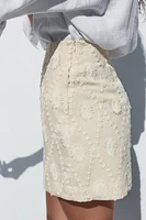 MINI-JUPE BRODERIES EFFRANGÉES
