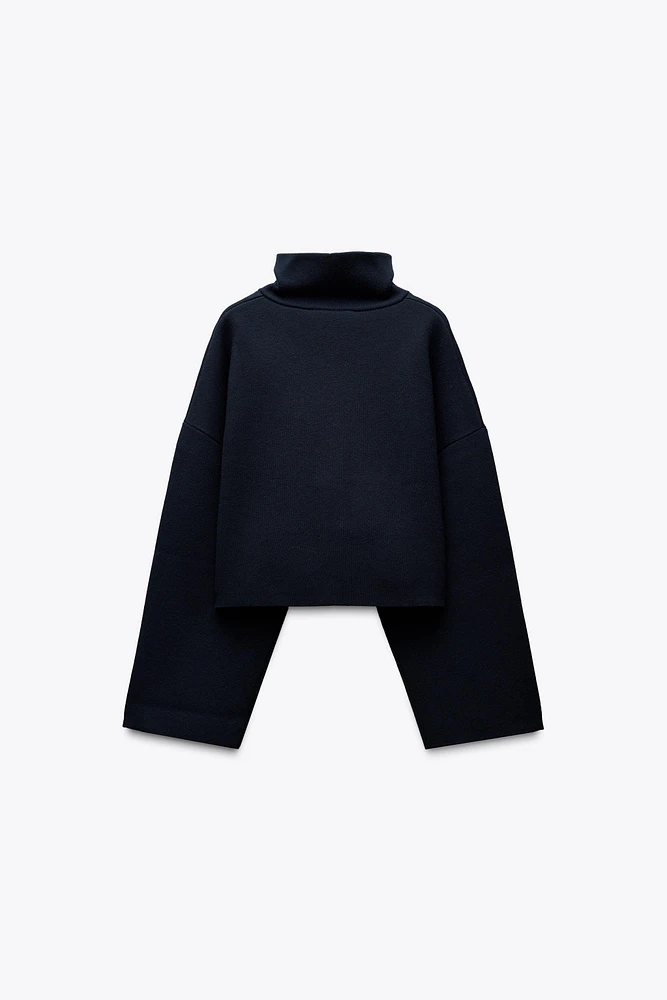 SWEAT COURT EN MAILLE AVEC LISERÉS