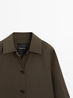 Technical fabric trench coat with button detail