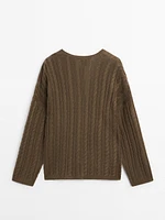 Pull maille en V tressé
