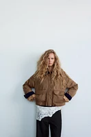 VESTE CIRÉE AVEC COL EN CONTRASTE