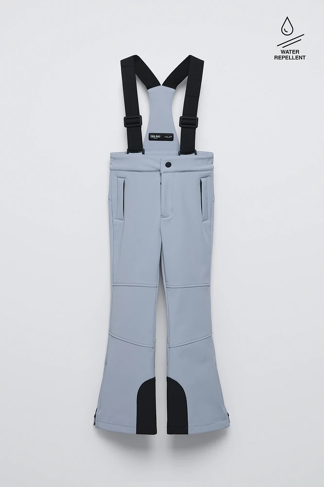 PANTALON À BRETELLES COUPE-VENT ET DÉPERLANT RECCO® SYSTEM SKI COLLECTION