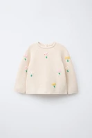 PULL EN MAILLE À MAILLES LINKS ET FLEURS BRODÉES