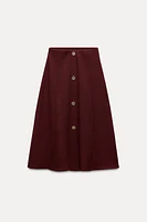JUPE MI-LONGUE SOFT À BOUTONS