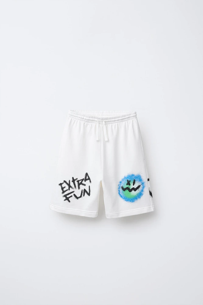 GRAFFITI PRINT BERMUDA SHORTS