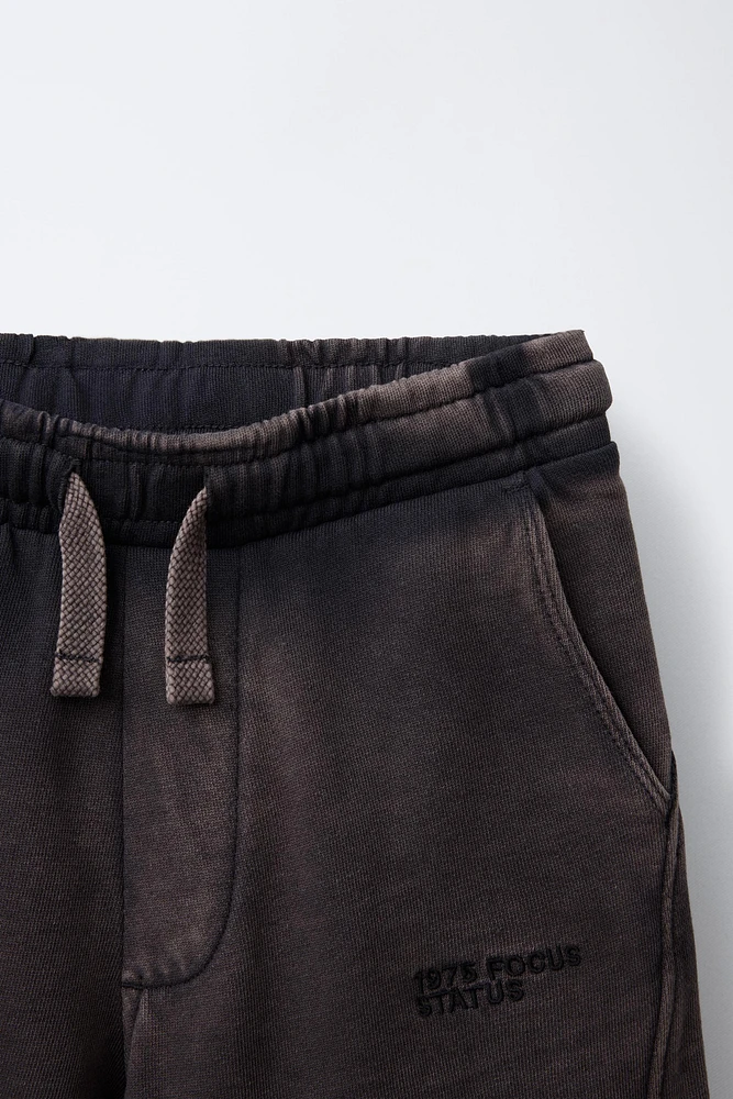 WORN EFFECT PLUSH SHORTS