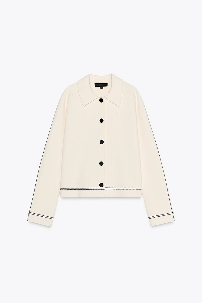VESTE EN MAILLE À LISERÉS