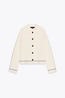 VESTE EN MAILLE À LISERÉS