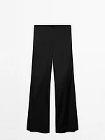 Pantalon flare satiné et fendu