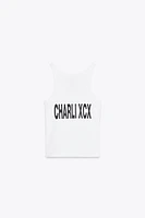 CHARLI XCX© STRAPPY TOP