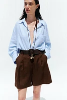 PLEATED BELT SHORTS