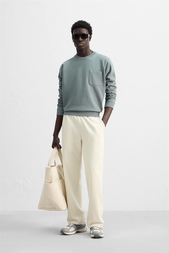 CREW NECK POCKET SWEATSHIRT