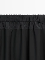 Technical fabric skirt with wool