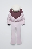WINDPROOF AND WATER REPELLENT DOWN JUMPSUIT RECCO® SYSTEM SKI COLLECTION