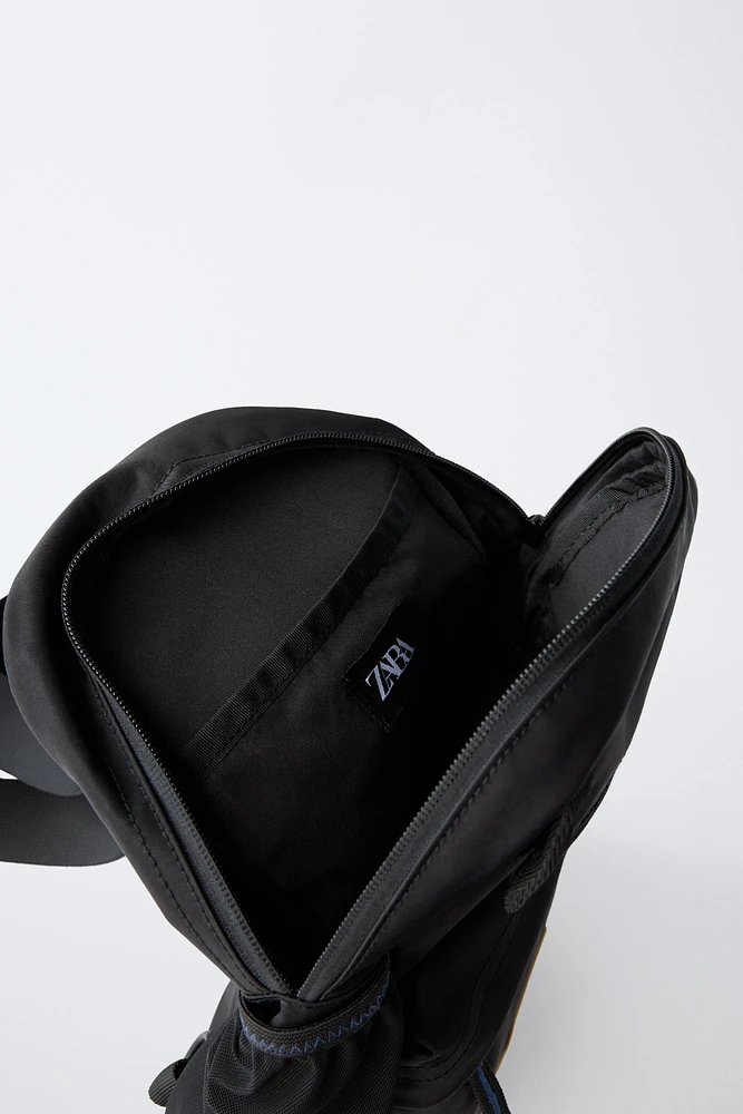 MULTI-POCKET CROSSBODY BAG