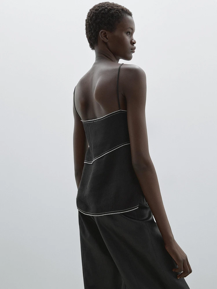 Top with contrasting topstitching