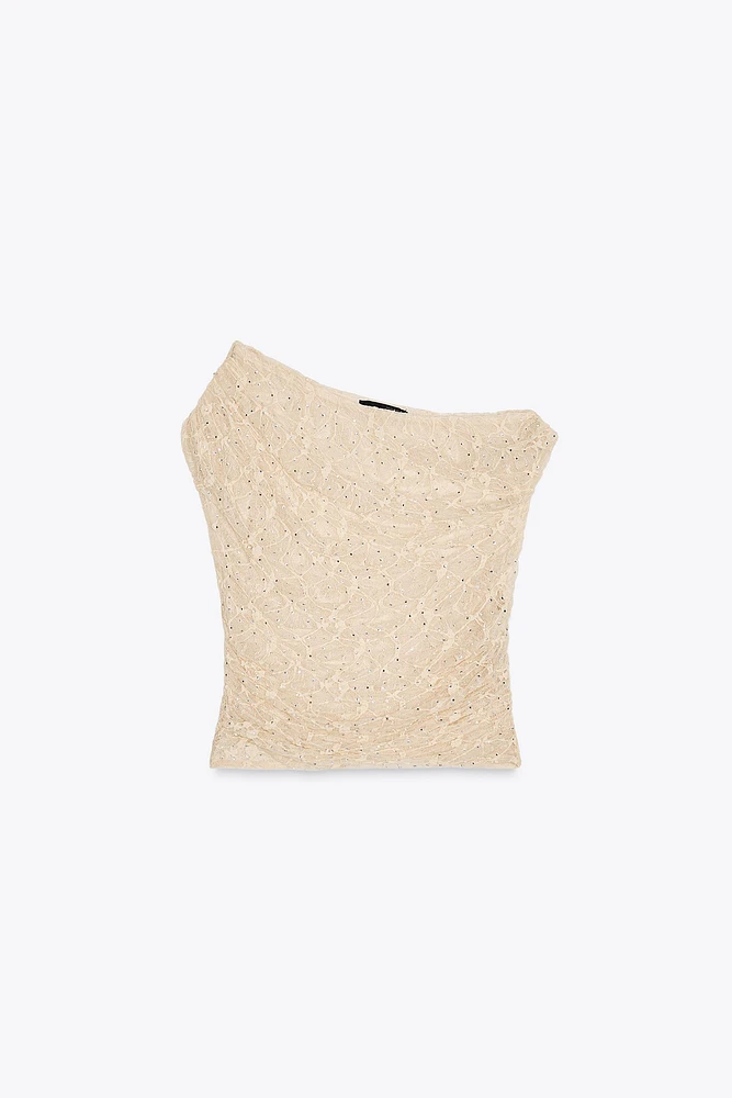 TOP DRAPÉ EN DENTELLE AVEC STRASS