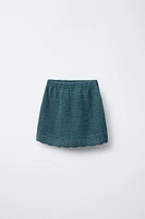 JUPE EN MAILLE DE CROCHET À FLEURS