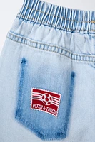 JEAN WIDE LEG À PIÈCES