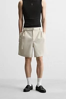 PLEATED BERMUDA SHORTS WITH BELT