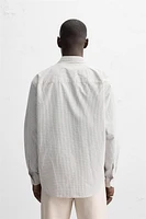 CHEMISE À CARREAUX AVEC POCHE