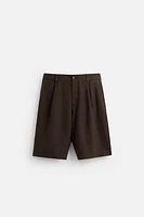 TEXTURED PLEATED SHORTS