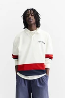 POLO WITH CONTRASTING SIDE STRIPE