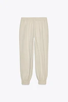PANTALON POIGNETS BAS