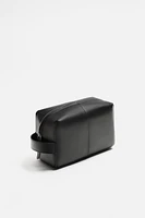 TROUSSE EN CUIR