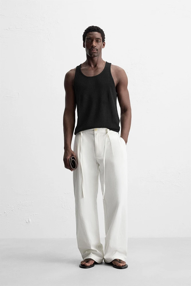 RELAXED FIT PLEATED PANTS