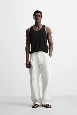 RELAXED FIT PLEATED PANTS