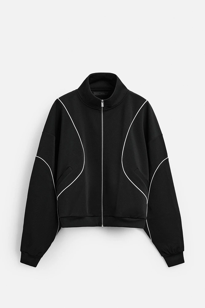 VESTE TECHNIQUE CONTRASTÉE