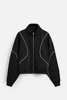 VESTE TECHNIQUE CONTRASTÉE