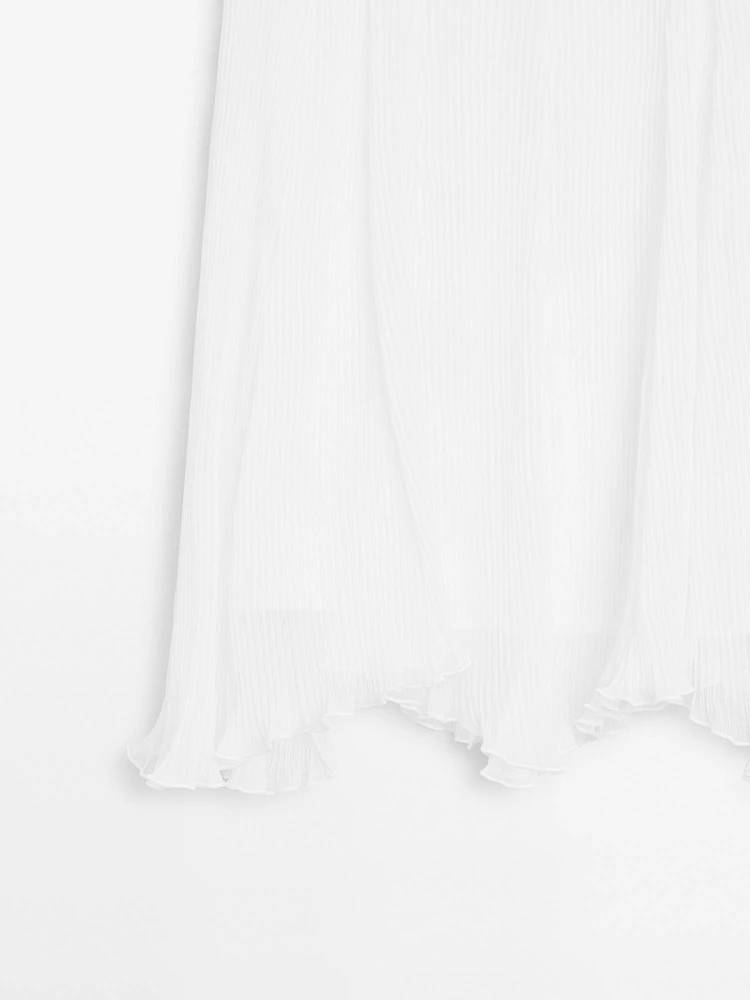 Pleated skirt with godet detail