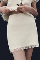 FRAYED MINI SKIRT