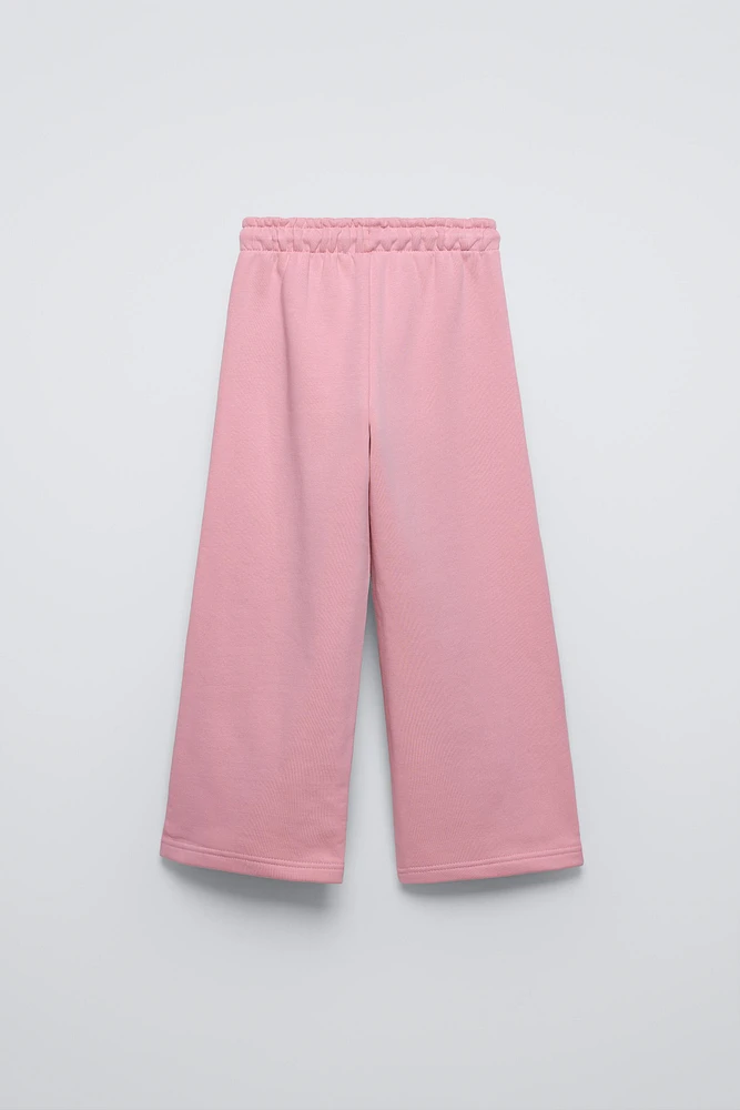 PLUSH WIDE LEG TEXT PANTS