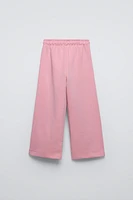 PLUSH WIDE LEG TEXT PANTS