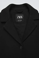 MANTEAU CONTENANT DE LA LAINE