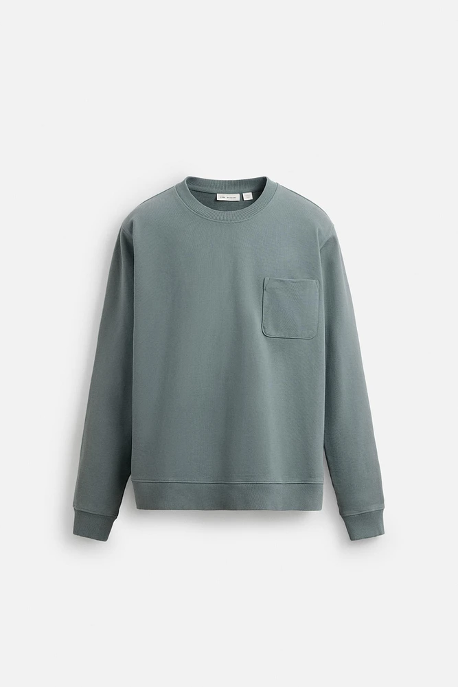 CREW NECK POCKET SWEATSHIRT