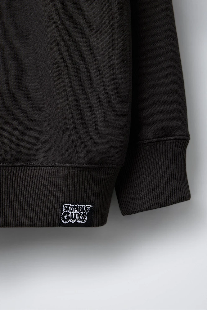 STUMBLE GUYS ™ © SCOPELY EMBOSSED SWEATSHIRT