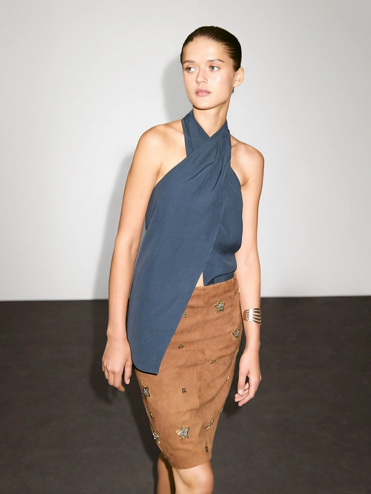 Suede leather skirt with rhinestone detail