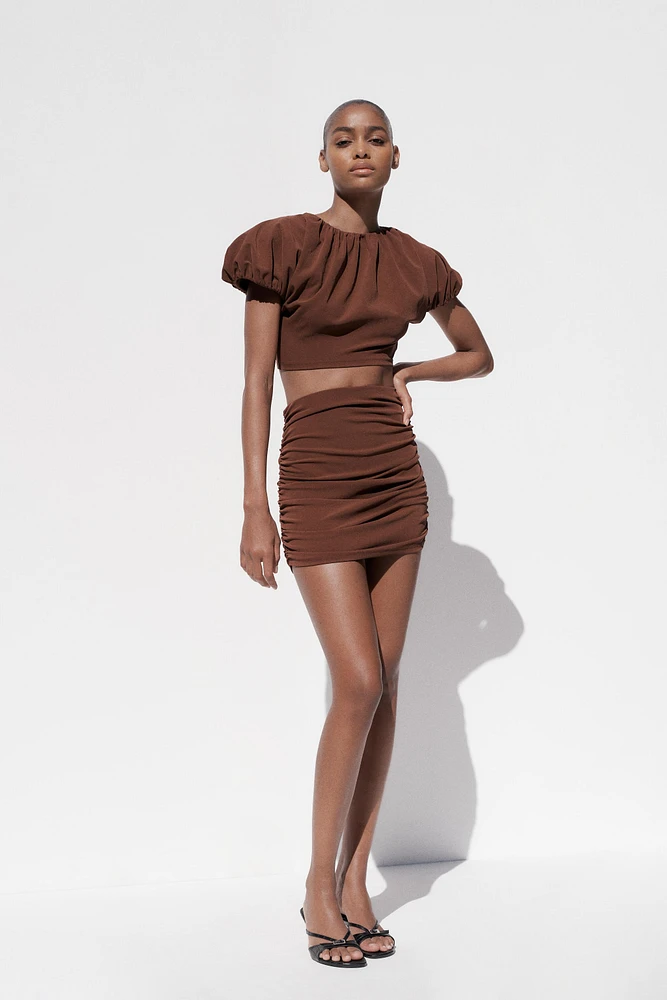 RUCHED MINI SKIRT