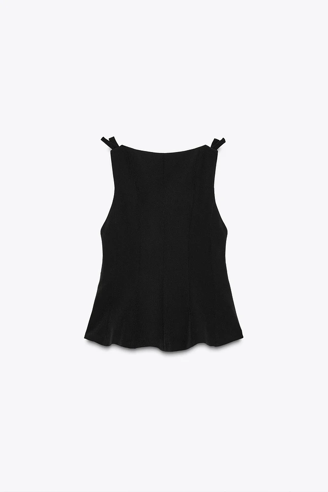 TOP PÉPLUM À LACETS