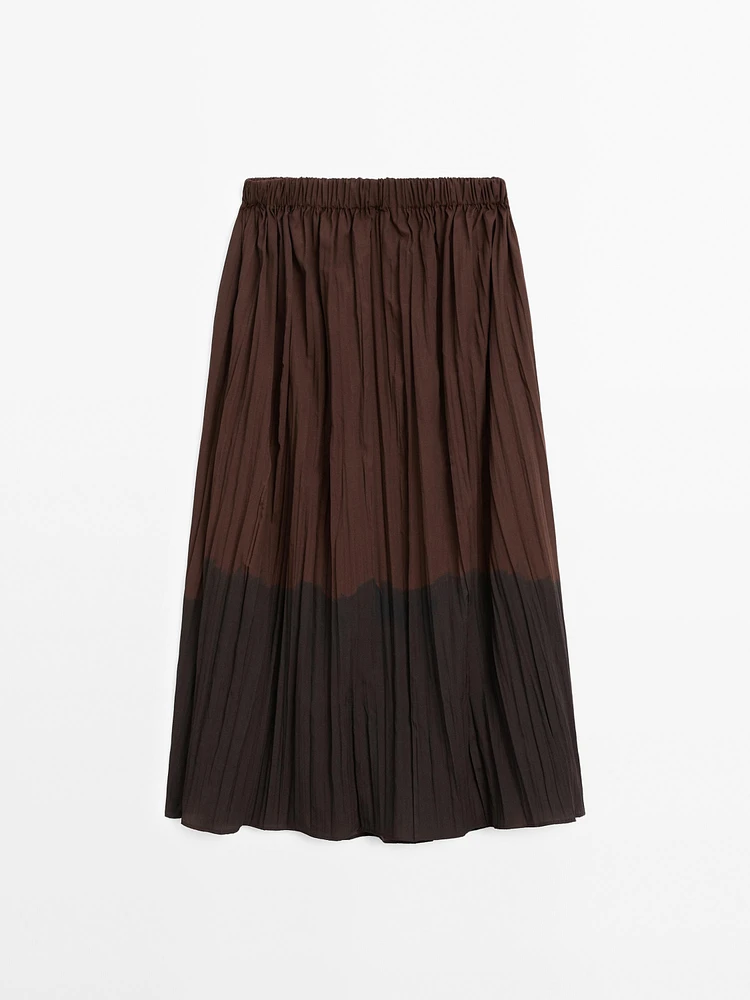 Long flowing pleated skirt