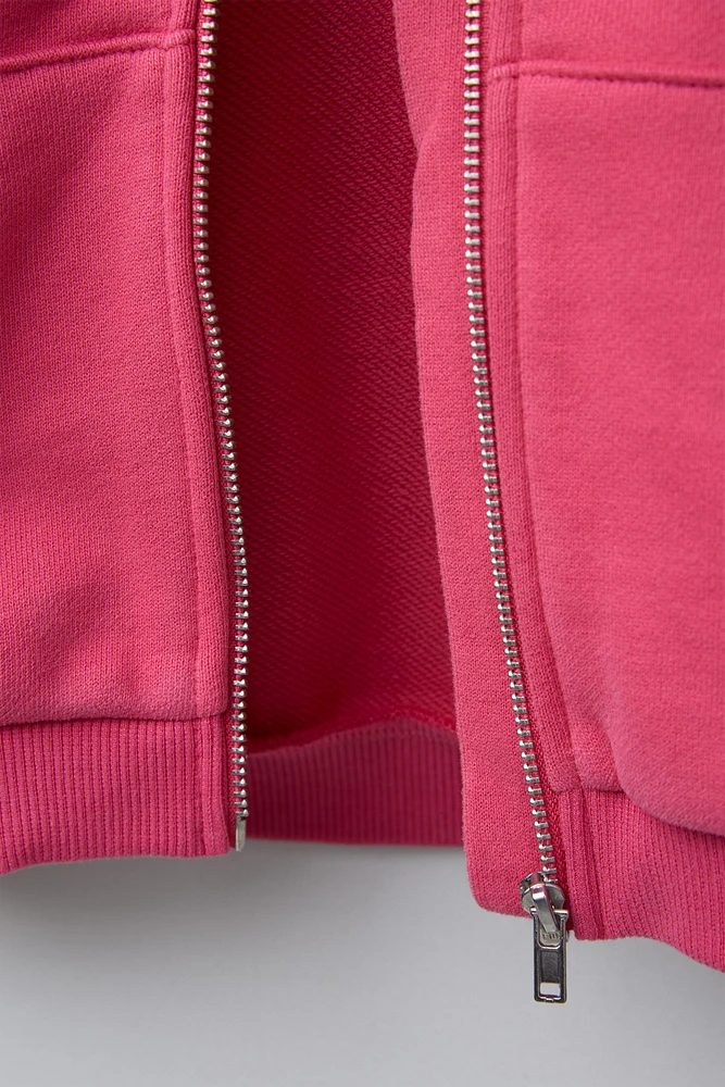 SWEAT À CAPUCHE ET LOGO